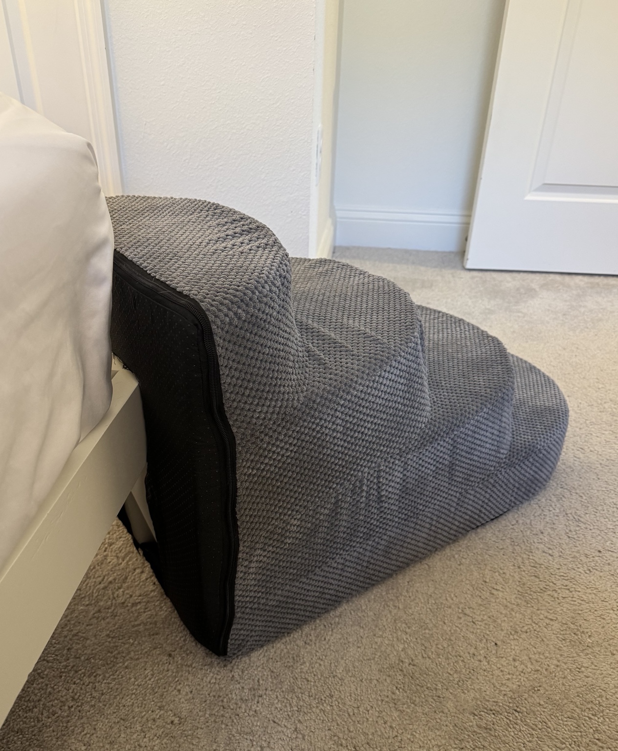 Functional Prototype 1 of the EZ Pet corner-access concept viewed from above beside a bed
